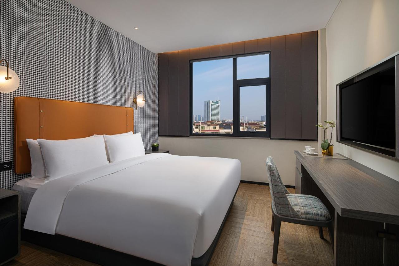 Kasion Pugis Hotel ييوو المظهر الخارجي الصورة