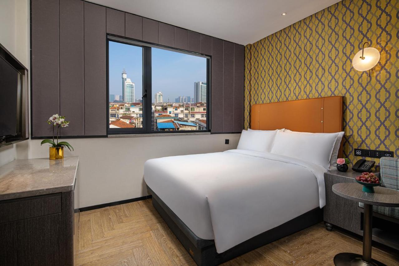 Kasion Pugis Hotel ييوو المظهر الخارجي الصورة