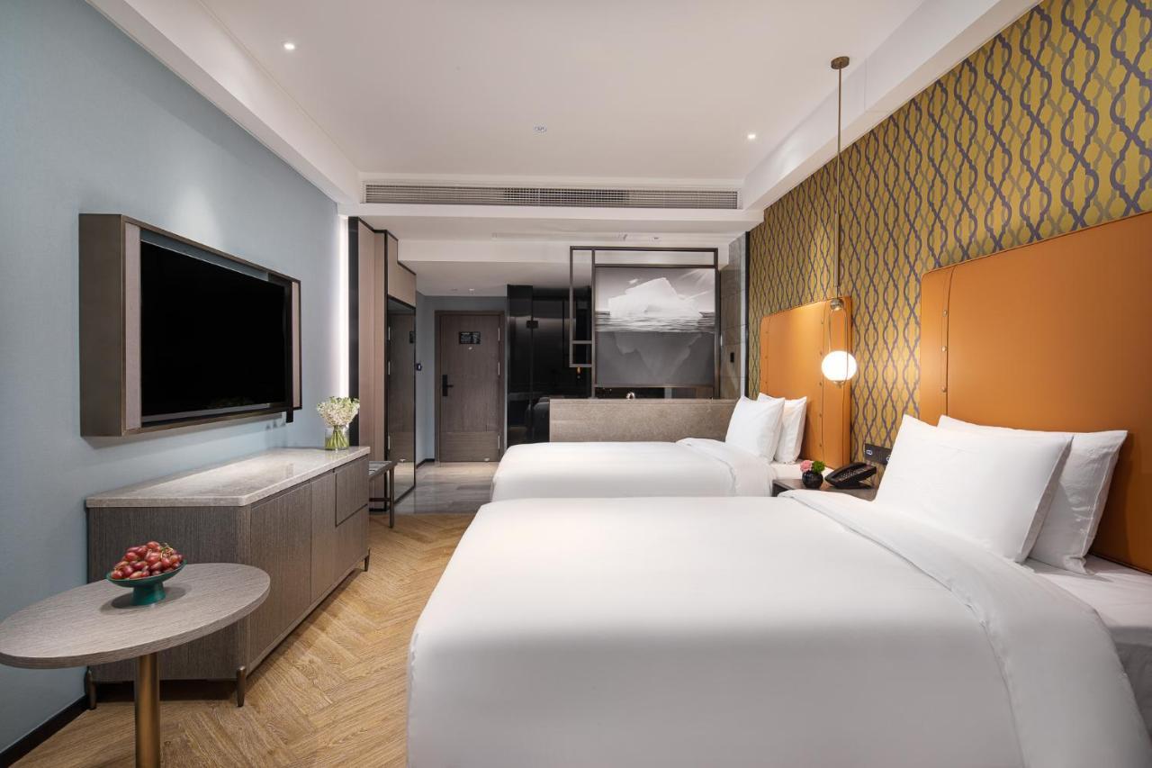 Kasion Pugis Hotel ييوو المظهر الخارجي الصورة