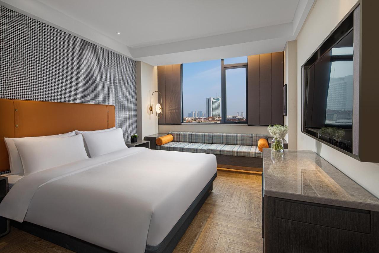 Kasion Pugis Hotel ييوو المظهر الخارجي الصورة