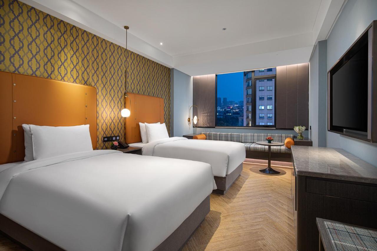 Kasion Pugis Hotel ييوو المظهر الخارجي الصورة