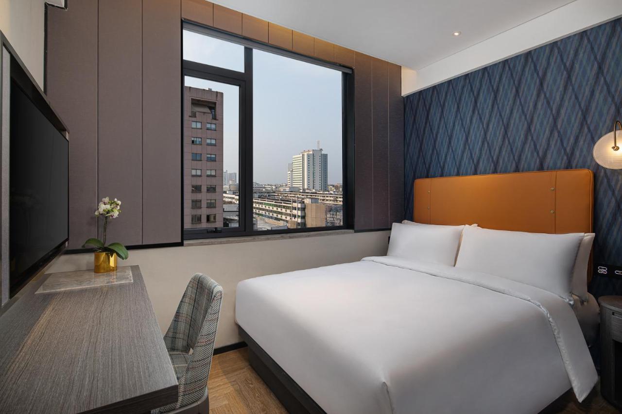 Kasion Pugis Hotel ييوو المظهر الخارجي الصورة