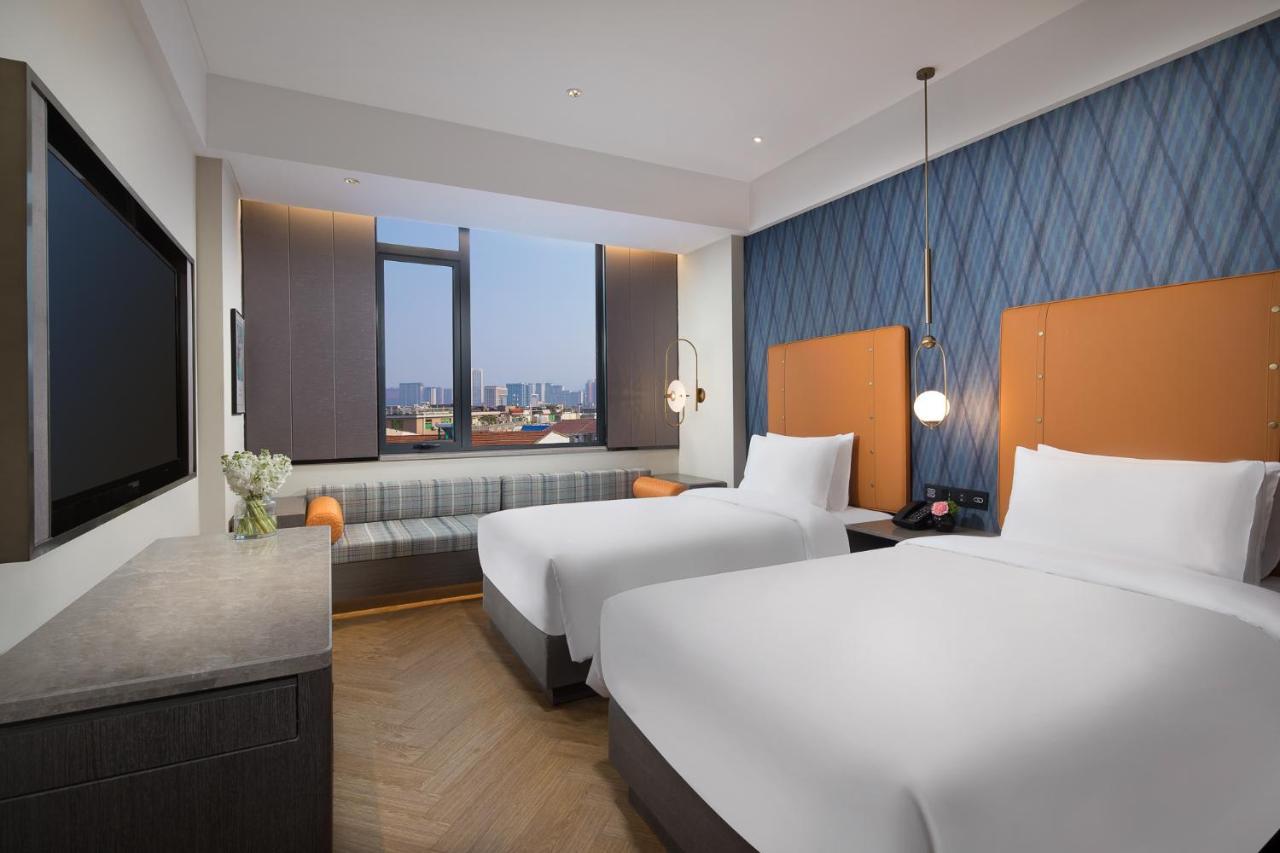 Kasion Pugis Hotel ييوو المظهر الخارجي الصورة