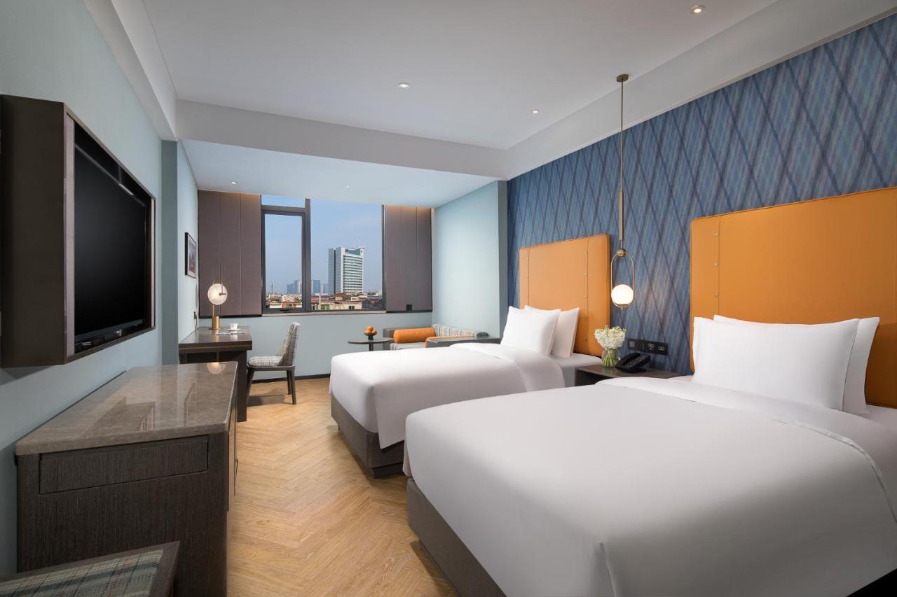 Kasion Pugis Hotel ييوو المظهر الخارجي الصورة